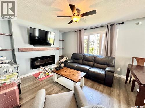 719 4Th Street E, Prince Albert, SK - Indoor Photo Showing Living Room With Fireplace