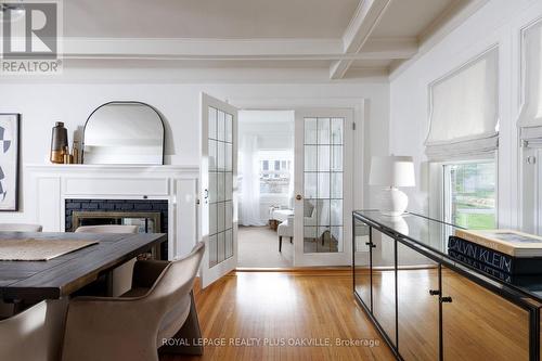 373 Rossmore Boulevard, Burlington, ON - Indoor Photo Showing Dining Room With Fireplace