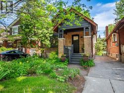 33 MORTIMER AVENUE Toronto, ON M4K 1Z9