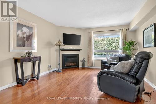 1 Chantilly Gate, Ottawa, ON - Indoor Photo Showing Living Room With Fireplace