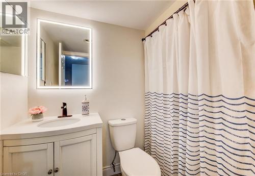 Updated bath has new counter, vanity, tap and mirror - 1414 King Street E Unit# 101, Kitchener, ON - Indoor Photo Showing Bathroom