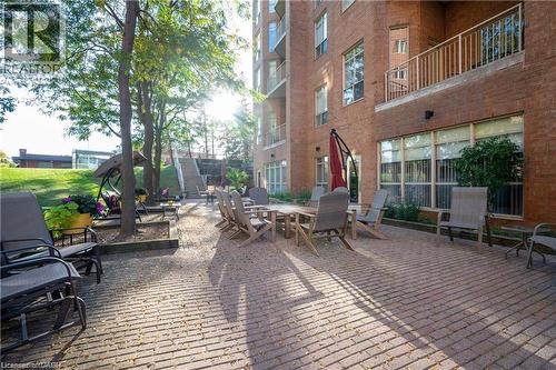 Community use patio - 1414 King Street E Unit# 101, Kitchener, ON - Outdoor