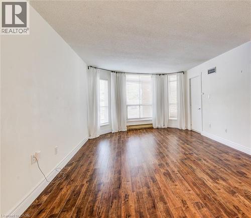 Large windows let in lots of light - 1414 King Street E Unit# 101, Kitchener, ON - Indoor Photo Showing Other Room