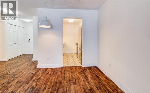 Newer flooring throughout - 1414 King Street E Unit# 101, Kitchener, ON - Indoor Photo Showing Other Room