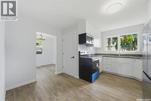 3 Rutter Crescent, Saskatoon, SK - Indoor Photo Showing Kitchen With Double Sink