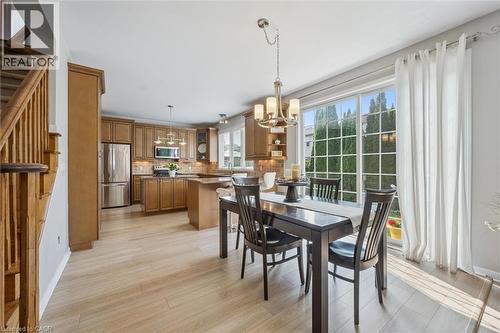 Kitchen space off of Family Room with access via oversize patio doors to fenced backyard - 79 Zieman Crescent, Cambridge, ON - Indoor Photo Showing Dining Room