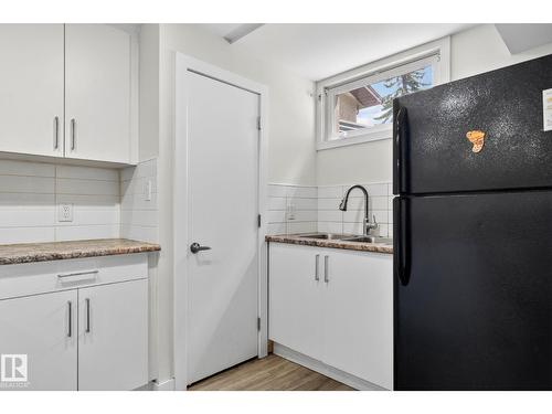 #53 7604 29 Av Nw, Edmonton, AB - Indoor Photo Showing Kitchen With Double Sink