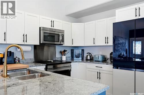 415 Boykowich Street, Saskatoon, SK - Indoor Photo Showing Kitchen With Double Sink