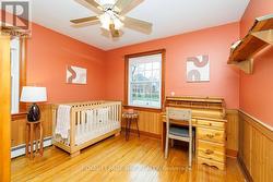 The 2nd bdrm overlooks front and side yard - 