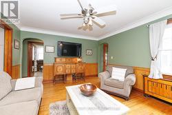 Rich hardwood floors, wood trim & wainscoting - 