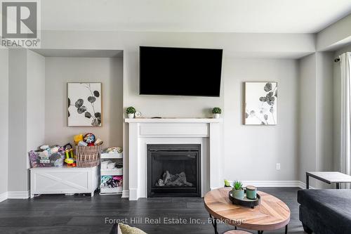 281 Springfield Crescent, Clearview (Stayner), ON - Indoor Photo Showing Living Room With Fireplace