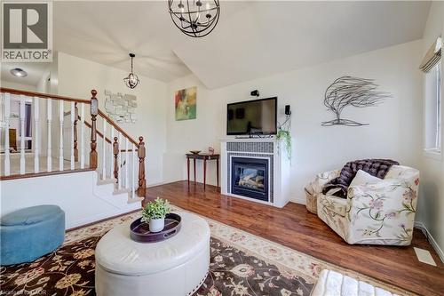 295 Oprington Place, Kitchener, ON - Indoor Photo Showing Living Room With Fireplace