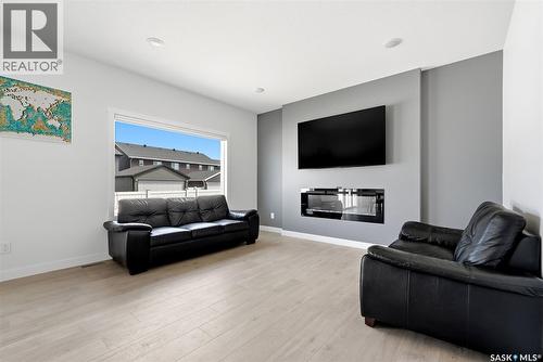 5416 Boyer Bay, Regina, SK - Indoor Photo Showing Living Room With Fireplace