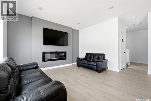 5416 Boyer Bay, Regina, SK - Indoor Photo Showing Living Room With Fireplace