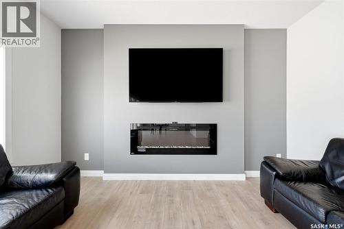 5416 Boyer Bay, Regina, SK - Indoor Photo Showing Living Room With Fireplace