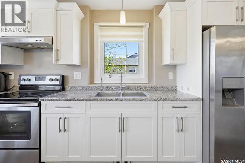 201 Rajput Way, Saskatoon, SK - Indoor Photo Showing Kitchen With Stainless Steel Kitchen With Double Sink With Upgraded Kitchen