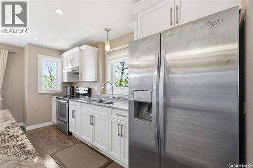 201 Rajput Way, Saskatoon, SK - Indoor Photo Showing Kitchen With Stainless Steel Kitchen With Double Sink