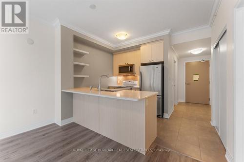 213 - 10 Concord Place, Grimsby, ON - Indoor Photo Showing Kitchen
