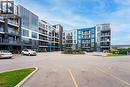 10 Concord Place Unit# 213, Grimsby, ON  - Outdoor With Facade 