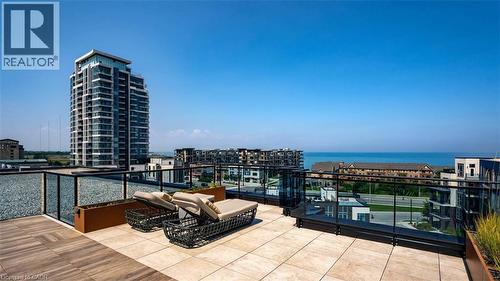10 Concord Place Unit# 213, Grimsby, ON - Outdoor With Body Of Water