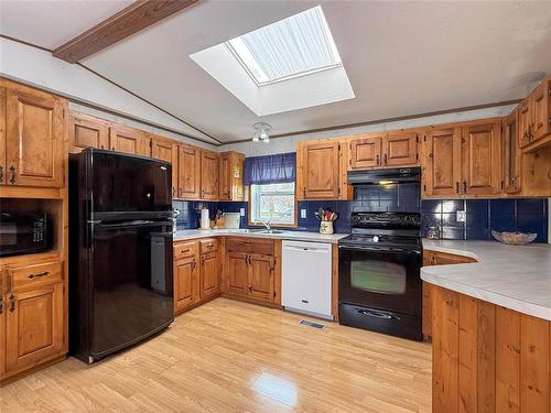 117 Gordon Place, Brandon, MB - Indoor Photo Showing Kitchen With Double Sink