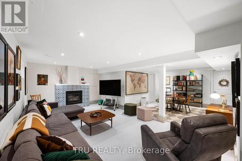 64 Stevenson Avenue, Ottawa, ON - Indoor Photo Showing Living Room With Fireplace