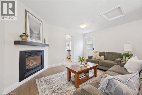 793 Belmont Avenue W, Kitchener, ON - Indoor Photo Showing Living Room With Fireplace