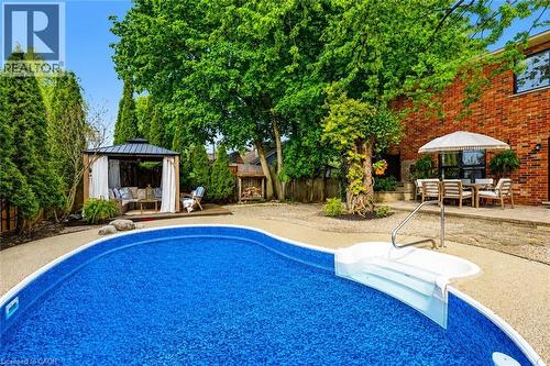 329 Plains Road W, Burlington, ON - Outdoor With In Ground Pool With Deck Patio Veranda With Backyard