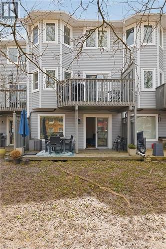 Multi-story exterior with horizontal siding and multiple bay windows - 245 Bishop Street S Unit# 31, Cambridge, ON - Outdoor With Deck Patio Veranda