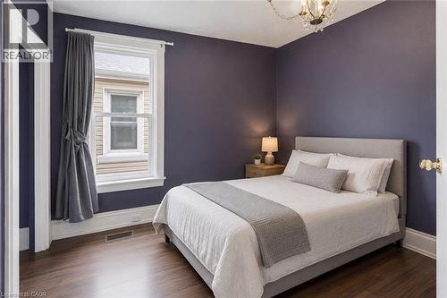 First bedroom virtually staged - 46 East 16Th Street, Hamilton, ON - Indoor Photo Showing Bedroom