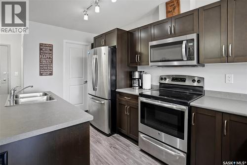 305 2452 Killdeer Drive, North Battleford, SK - Indoor Photo Showing Kitchen With Stainless Steel Kitchen With Double Sink