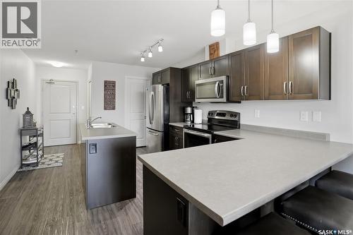 305 2452 Killdeer Drive, North Battleford, SK - Indoor Photo Showing Kitchen With Stainless Steel Kitchen