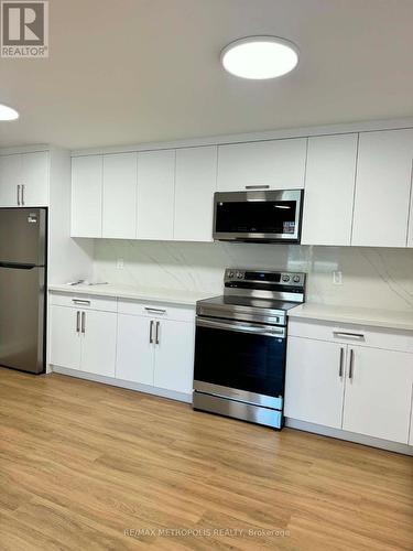 106 - 1445 Wilson Avenue, Toronto, ON - Indoor Photo Showing Kitchen