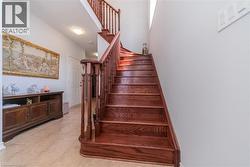 Hardwood staircase with turned newel posts and balusters - 