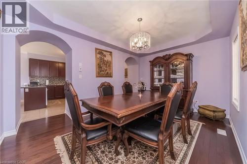 Formal dining area featuring hardwood flooring - 675 Best Road, Milton, ON - Indoor Photo Showing Dining Room