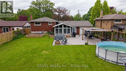 4480 Queensway Gardens, Niagara Falls (Morrison), ON - Outdoor With Above Ground Pool With Deck Patio Veranda With Backyard