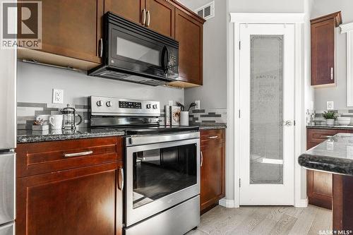 327 Roy Crescent, Saskatoon, SK - Indoor Photo Showing Kitchen With Stainless Steel Kitchen