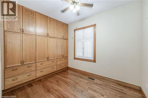 Built-in wood-finish cabinetry featuring multiple drawers and upper storage - 252 Beechwood Avenue, Hamilton, ON - Indoor Photo Showing Other Room