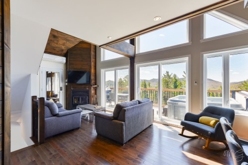 Salon - 100 Rue Du Golf, Saint-Côme, QC - Indoor Photo Showing Living Room With Fireplace