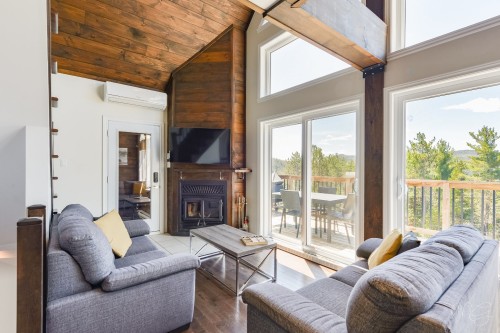 Salon - 100 Rue Du Golf, Saint-Côme, QC - Indoor Photo Showing Living Room With Fireplace