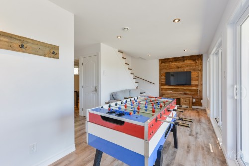 Salle familiale - 100 Rue Du Golf, Saint-Côme, QC - Indoor Photo Showing Other Room
