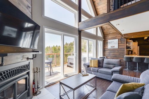 Salon - 100 Rue Du Golf, Saint-Côme, QC - Indoor Photo Showing Living Room With Fireplace