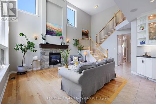 90 Stonewater Bay, Carleton Place, ON - Indoor Photo Showing Living Room With Fireplace