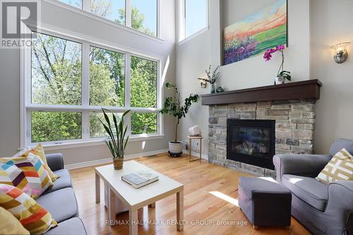 90 Stonewater Bay, Carleton Place, ON - Indoor Photo Showing Living Room With Fireplace
