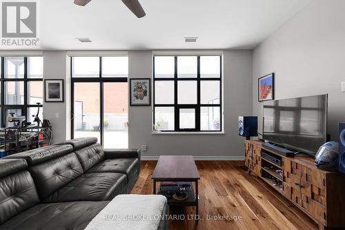 204 - 21 Matchedash Street S, Orillia, ON - Indoor Photo Showing Living Room