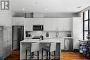 204 - 21 Matchedash Street S, Orillia, ON  - Indoor Photo Showing Kitchen With Upgraded Kitchen 