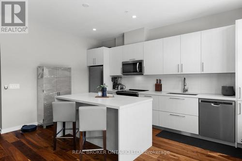 204 - 21 Matchedash Street S, Orillia, ON - Indoor Photo Showing Kitchen With Upgraded Kitchen
