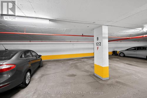 101 - 700 Dynes Road, Burlington, ON - Indoor Photo Showing Garage