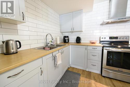 Apartment Kitchen - 37 Marilyn Avenue N, Wasaga Beach, ON - Indoor Photo Showing Kitchen With Double Sink