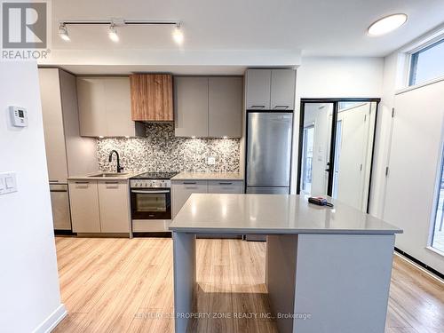 06 - 20 Lagerfeld Drive, Brampton, ON - Indoor Photo Showing Kitchen With Upgraded Kitchen